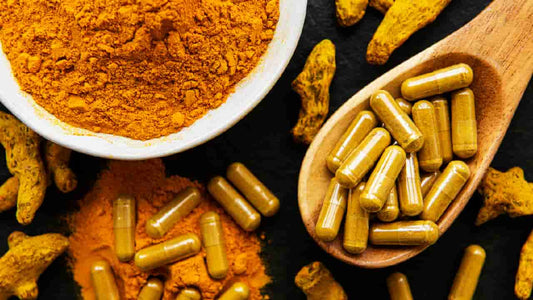 Different forms of turmeric supplements and curcumin supplements. Conveys the question "What are the turmeric benefits for men?”