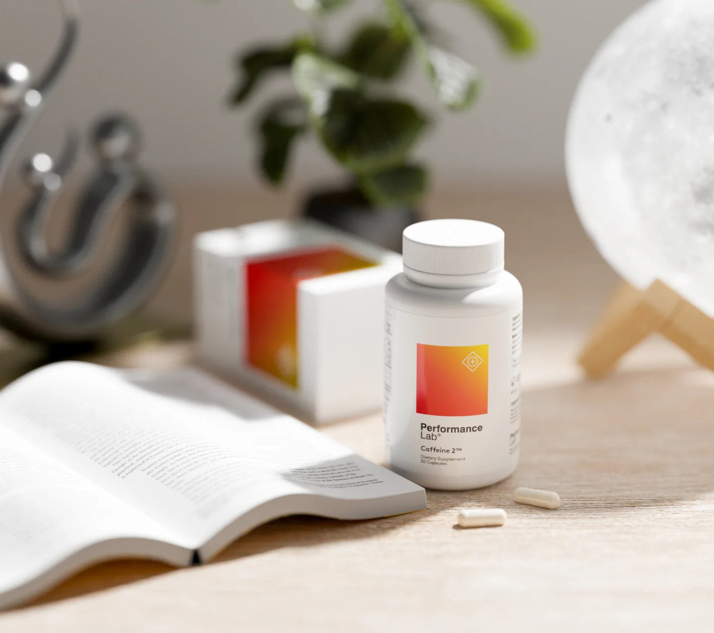 image of Caffeine 2™ bottle sitting on a table