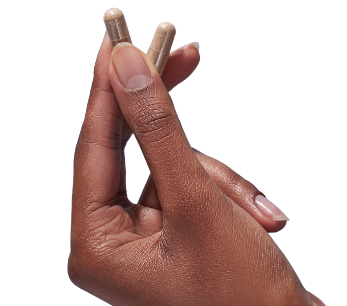 image of hand holding Performance Lab® products