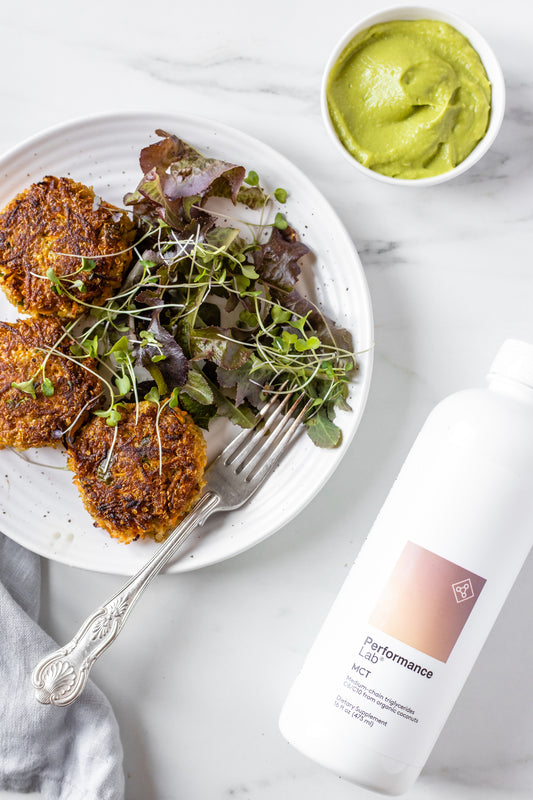 Carrot fritters with salad, avocado dip and Performance Lab MCT oil 