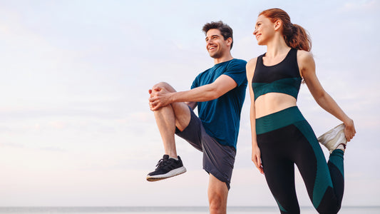 How Long Does Glutathione Take To Work? A couple are warming up and stretching ready to start an early morning outdoor workout.