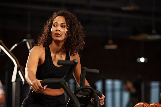 Woman performing cardio in the gym working on her aerobic endurance