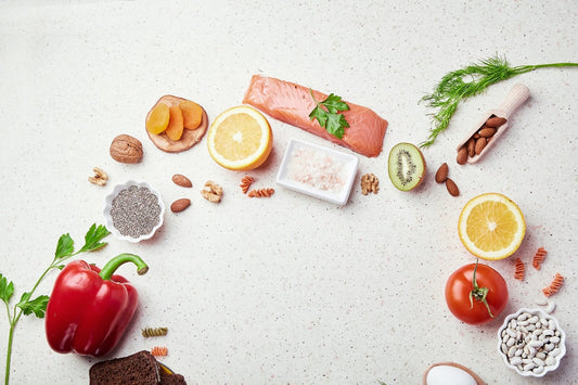 Joint Food Guide. Salmon, citrus, nuts, beans, and vegetables displayed as joint-healthy foods.
