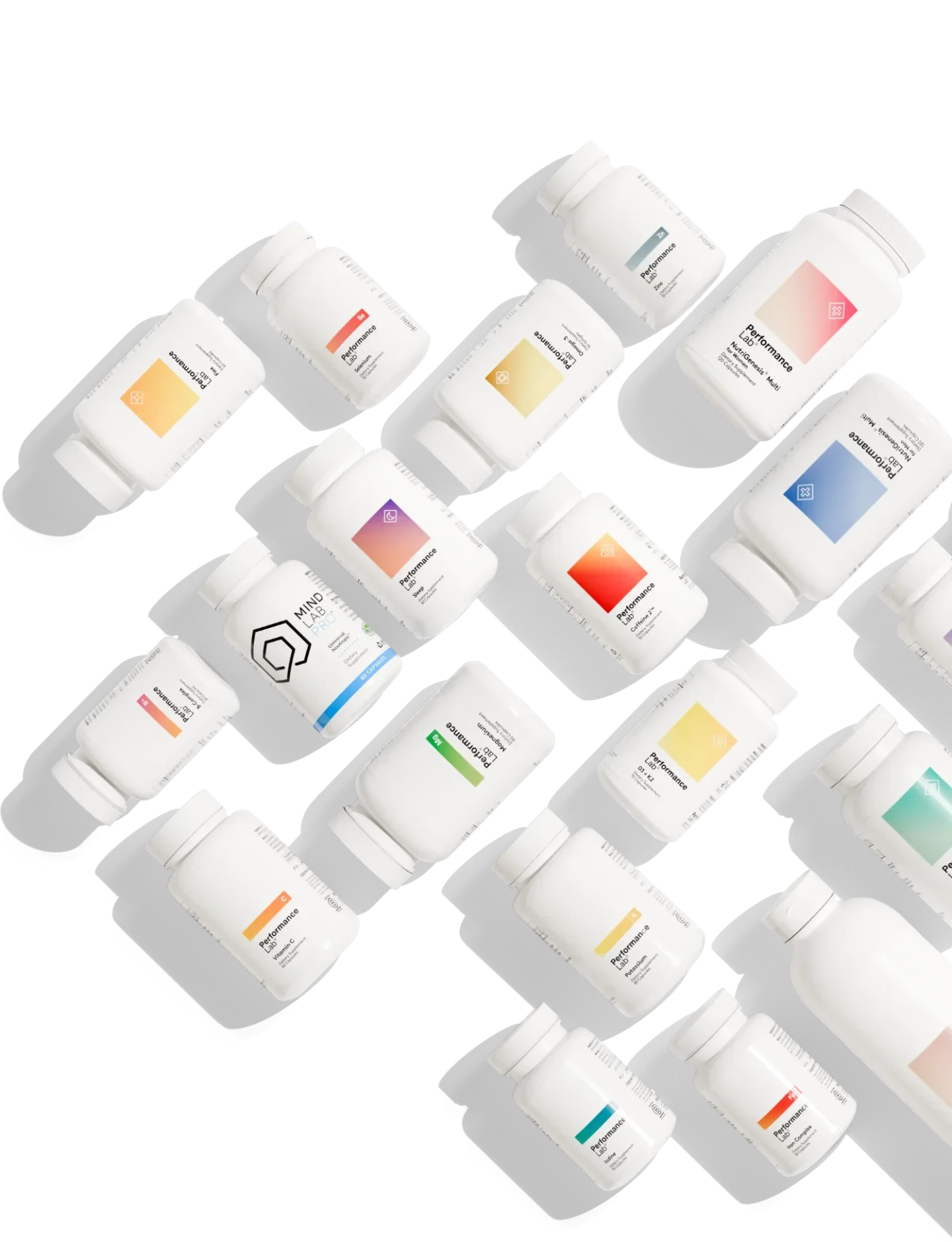 An assortment of Performance Lab and Mind Lab Pro supplement bottles scattered diagonally across a grey background.