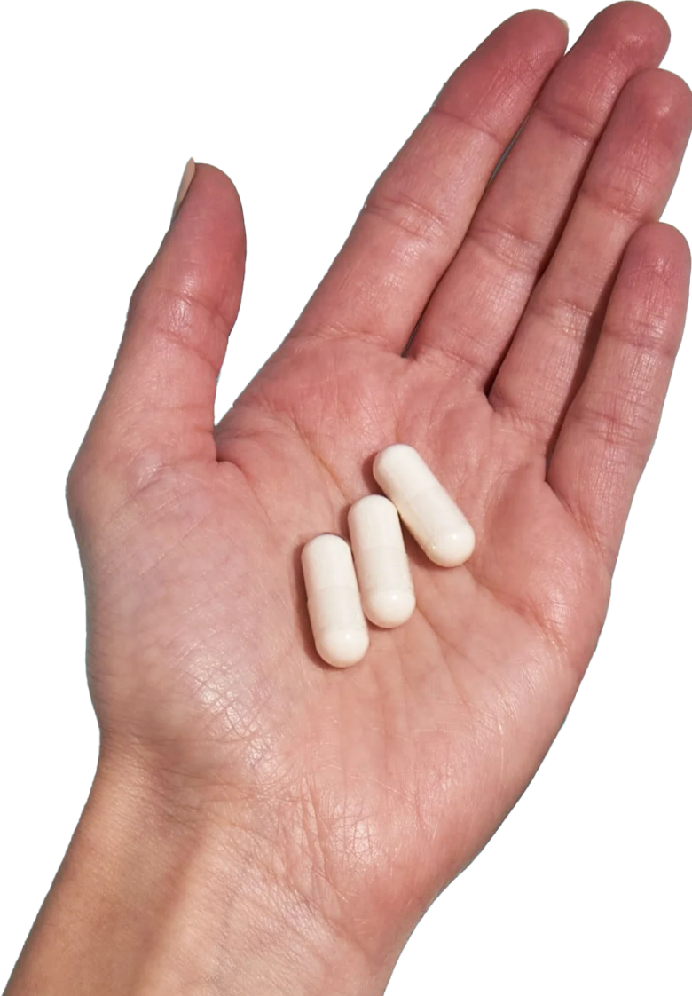 image of hand holding 3  Calcium capsules